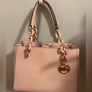 Medium sized Michael Kors pink with great condition
